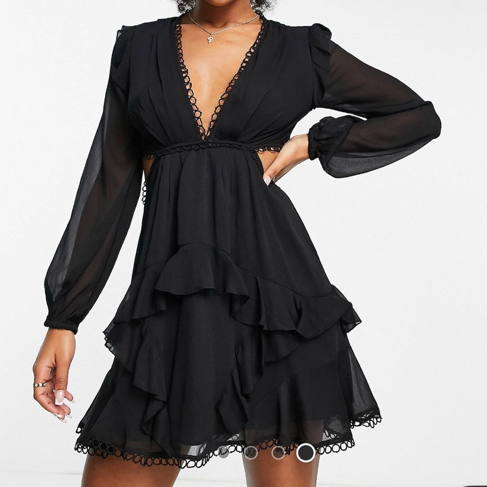 Black cut out long sleeve mini dress with trim